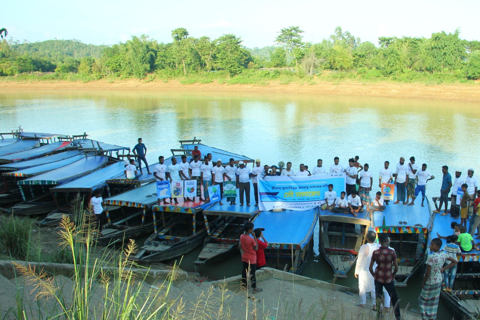 জীবাশ্ম জ্বালানির দ্রুত, ন্যায্য এবং ন্যায়সঙ্গত সমাপ্তির দাবিতে নৌ সমাবেশ